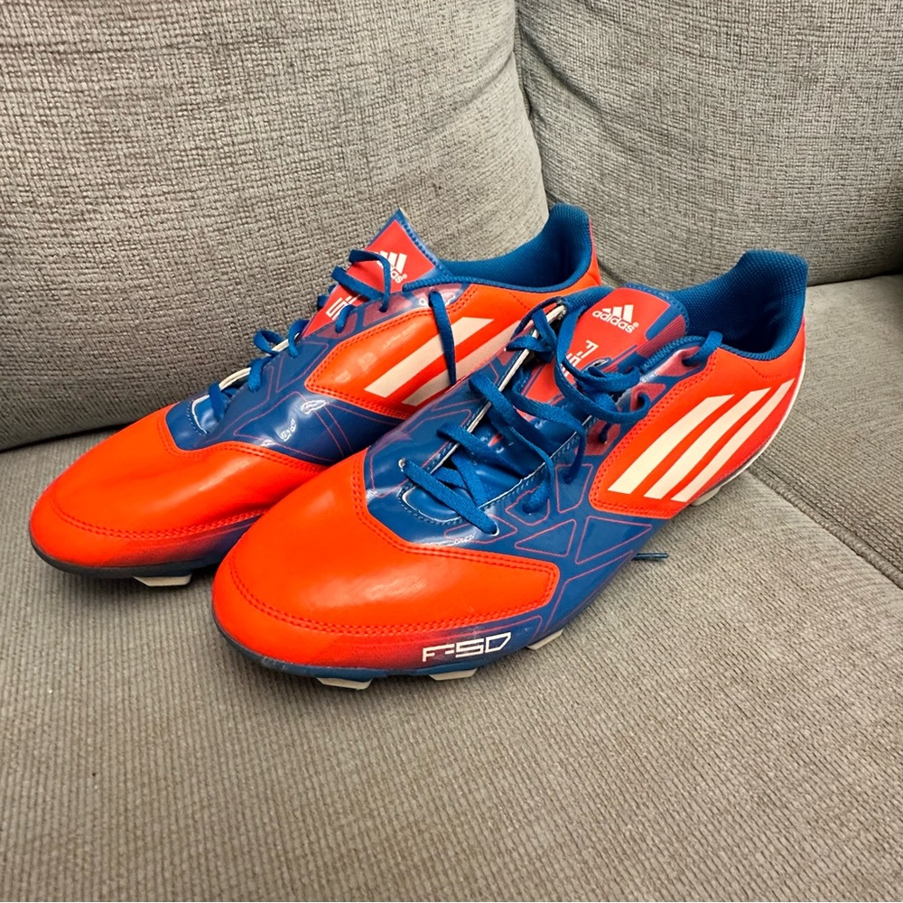 ADIDAS F-50 MEN'S SOCCER CLEATS
BLUE WHITE ORANGE SIZE 13 ART
V21455